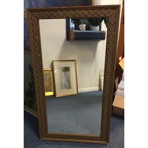 872 - A large rectangular gilt framed mirror. Est. £30 - £50.