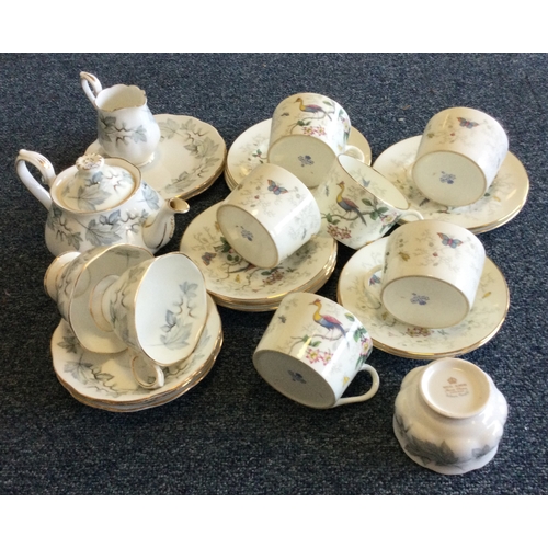 883 - A collection of Royal Albert bone china together with a Coalport set. Est. £30 - £40.