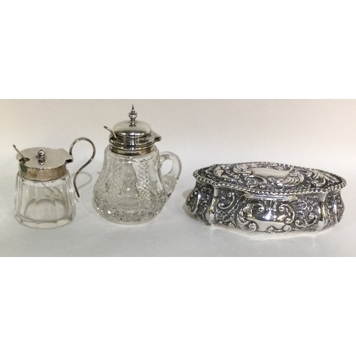 89 - Two silver and glass mounted bottles of shaped form together with an oval trinket box. Est. £30 - £4... 