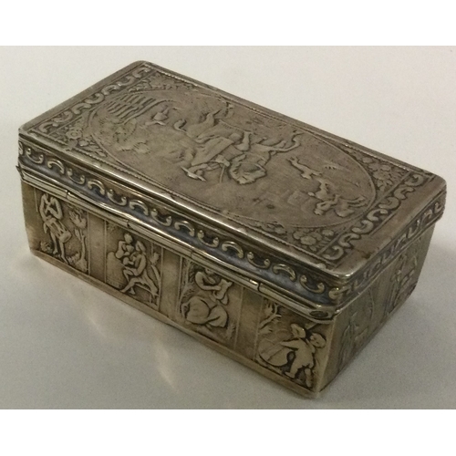 9 - A chased 19th Century German silver hinged snuff box. Marked to rim. Approx. 97 grams. Est. £80 - £1... 