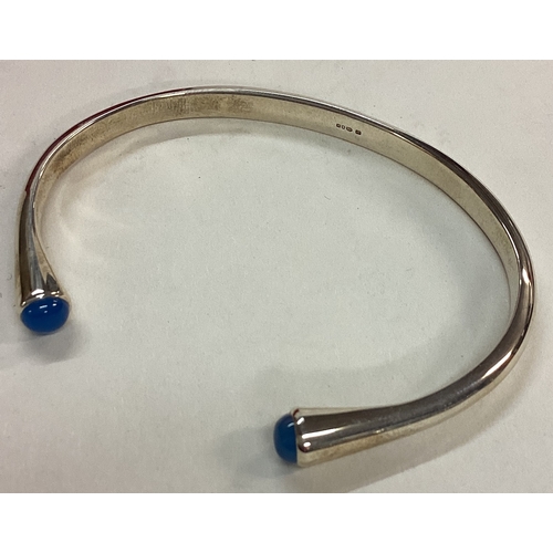 92 - A cased Inkerman silver and stone bangle. Approx. 24 grams. Est. £30 - £50.