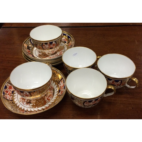 920 - A set of five Spode cups and saucers. Pattern number 1495. Est. £20 - £30.