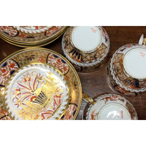 920 - A set of five Spode cups and saucers. Pattern number 1495. Est. £20 - £30.