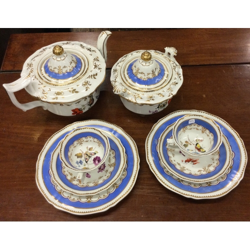 927 - A Machin part tea service decorated with butterflies. Pattern number 955. Est. £20 - £30.