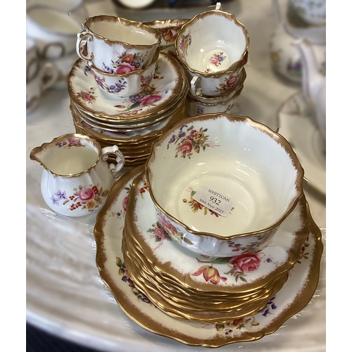 932 - An attractive Victorian tea service decorated with flowers. Est. £30 - £40.