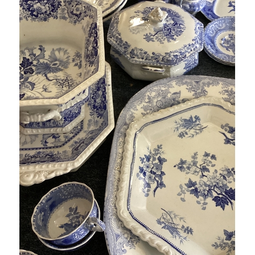 935 - An extensive Spode dinner and tea service in blue and white ground. Est. £30 - £40.