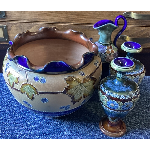 950 - A pair of Royal Doulton vases together with a ewer and a jardinière. Est. £25 - £30.