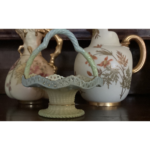 953 - Two Royal Worcester ewers with gilded decoration together with a bon bon dish. Est. £30 - £50.