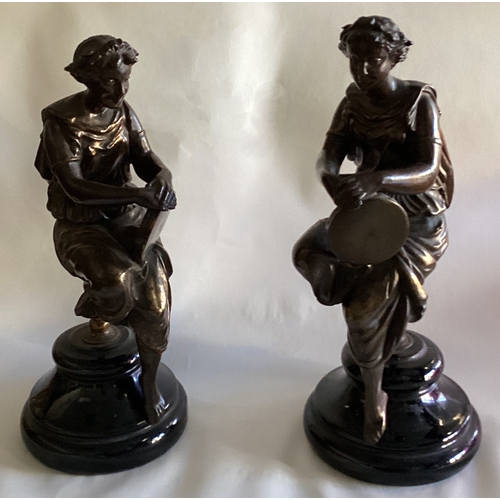 979 - A good pair of bronze ladies in seated position mounted on circular marble bases. By Harris & Sheldo... 