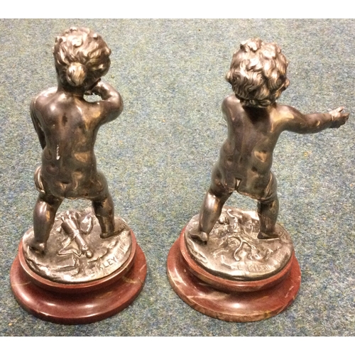 981 - LOUIS KLEY: (French, 1833 - 1911): A pair of silvered bronze children on circular marble socles. Sig... 