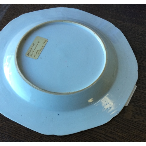 989 - A Chinese Nanking blue and white plate together with two others. Est. £30 - £50.