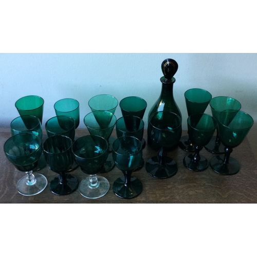 991 - A good collection of Antique green glass. Est. £50 - £80.