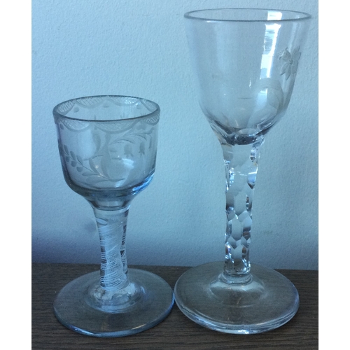 995 - Two good Georgian air-twist glasses of typical form to pedestal base. Est. £50 - £80.