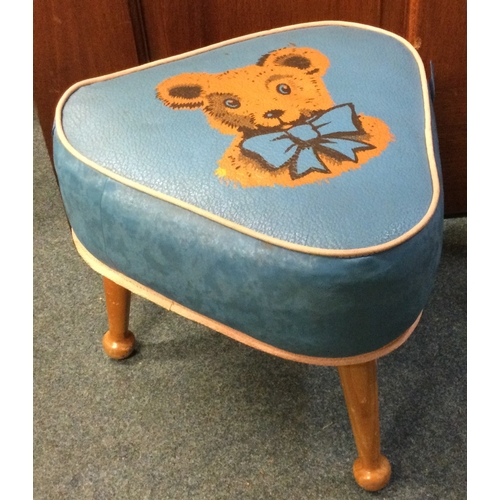 997 - A vintage 1950s / 60s Sherborne triangular child's stool with wooden legs and teddy bear design to s... 