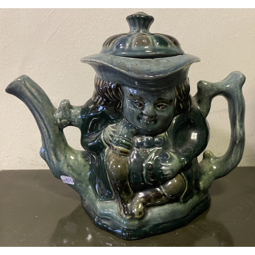 787C - LAUDER BARUM: An extremely rare 1890's Royal Devon Art Pottery teapot of Toby jug form with glazed b... 