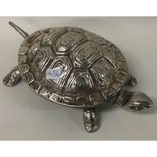 456 - CHESTER: A novelty silver table bell in the form of a tortoise. 1929. By Grey & Co. Approx. 394 gram... 