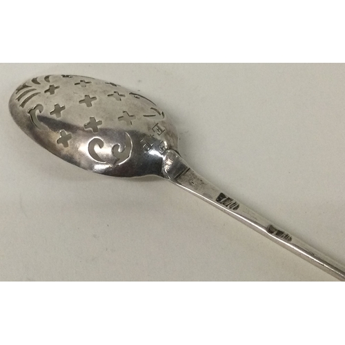 539 - An 18th Century George II silver mote spoon. Makers mark struck twice. Circa 1745.  By James Morriso... 