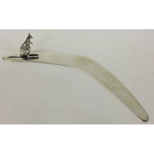 539D - AUSTRALIAN: An early 20th Century naturalistic silver boomerang cast with a kangaroo. Marked to base... 