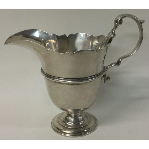 539G - An early 18th Century Irish silver cream jug. Circa 1740. By John Laughlin Senior. Approx. 217 grams... 