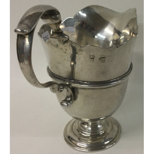 539G - An early 18th Century Irish silver cream jug. Circa 1740. By John Laughlin Senior. Approx. 217 grams... 