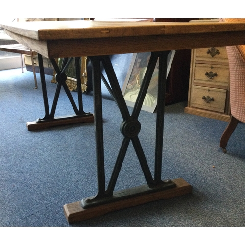 A good retro oak plank top table on a cast iron base. Est. £80 £120.