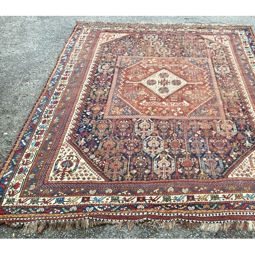 1671 - A good Oriental ground carpet / rug decorated in bright colours. Approx. 205 cms x 280 cms. Est. £80... 