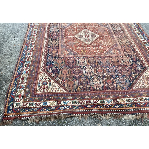 1671 - A good Oriental ground carpet / rug decorated in bright colours. Approx. 205 cms x 280 cms. Est. £80... 