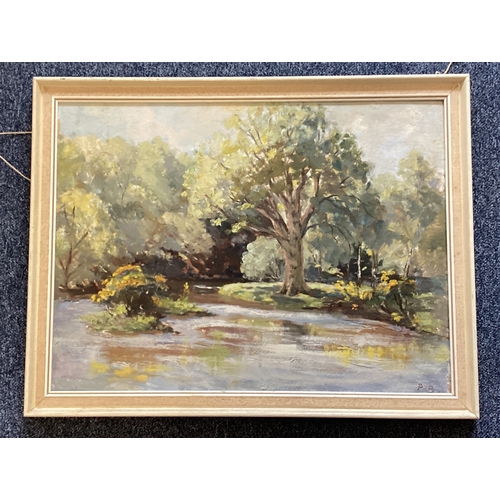 1145 - PEGGY DE BRETT: (British, 20th Century). A framed oil on board depicting a riverside scene with tree... 