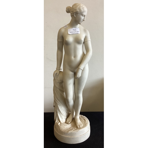 762 - A tall alabaster figure of a lady. Est. £30 - £40.