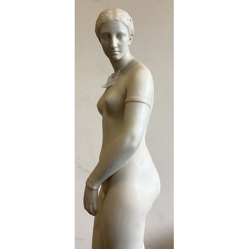 762 - A tall alabaster figure of a lady. Est. £30 - £40.