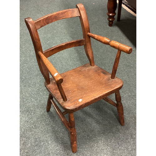 1675 - A small Antique child's chair. Est. £30 - £50.