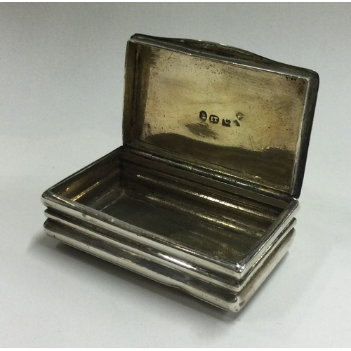 13 - A George III silver snuff box. London 1818. By John Taylor. Approx. 64 grams. Est. £120 - £150.