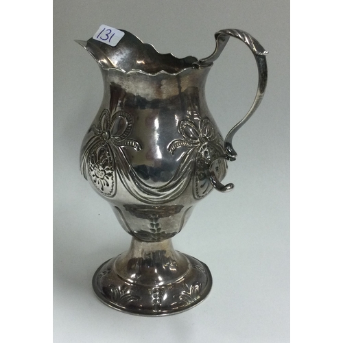 131 - An early 18th Century silver jug. London 1777. By Ann Smith & Nathaniel Appleton. Approx. 76 grams. ... 