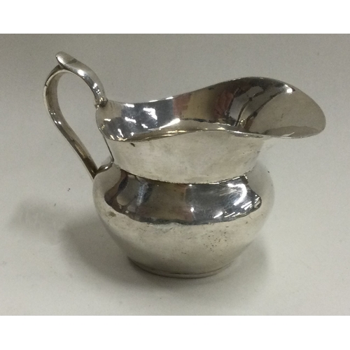 139 - A Chinese silver jug. Marked to base. Approx. 42 grams. Est. £30 - £50.