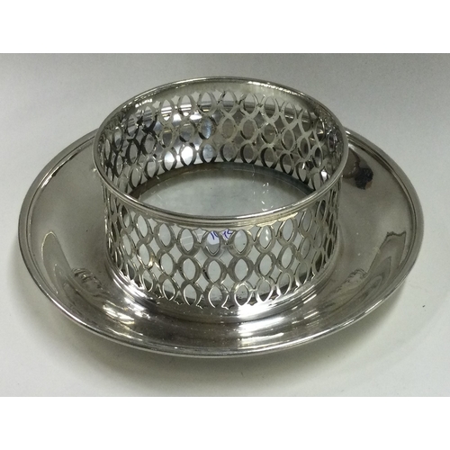 142 - TIFFANY & CO: A silver mounted glass centrepiece dish. Marked to base. Approx. 170 grams of gross we... 