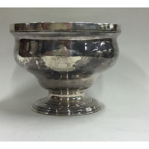 152 - An early 18th Century silver crested bowl. London 1752. Approx. 209 grams. Est. £300 - £500.