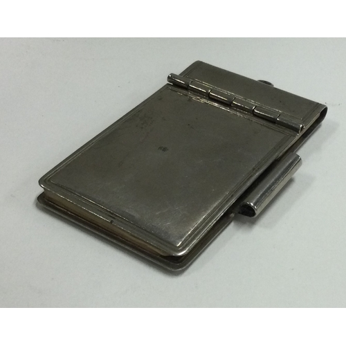 167 - A silver plated hinged note holder. Est. £20 - £30.