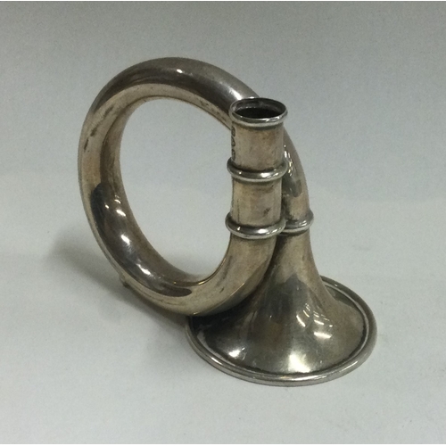 18 - CHESTER: A miniature silver trumpet. 1929. Approx. 25 grams. Est. £80 - £120.