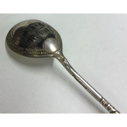 214 - A Russian silver and Niello spoon engraved with a castle. Approx. 21 grams. Est. £40 - £60.