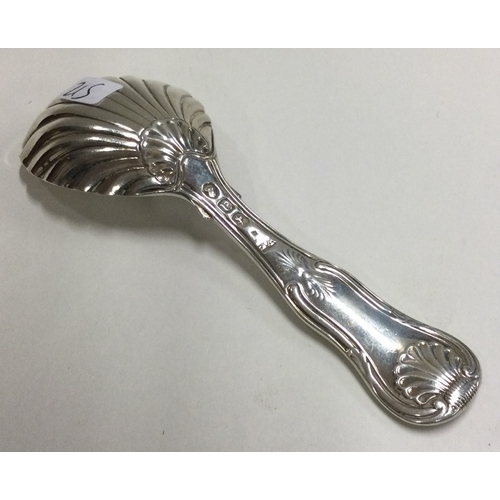 215 - A heavy George III silver caddy spoon with fluted bowl. London 1816. By William Eley. Approx. 28 gra... 