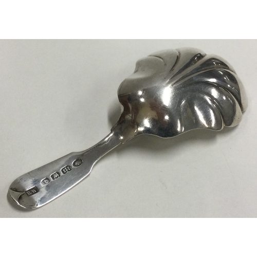 217 - EXETER: A William IV silver caddy spoon with fluted bowl. 1835. By Robert Williams. Approx. 14 grams... 