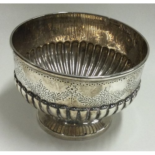 218 - A Victorian engraved silver bowl. Birmingham 1884. By George Unite. Approx. 93 grams. Est. £80 - £12... 