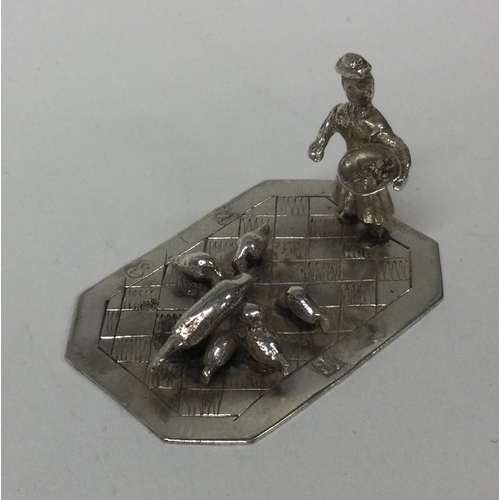 230 - An Antique Dutch silver miniature table toy. Marked thrice. Approx. 24 grams. Est. £30 - £50.