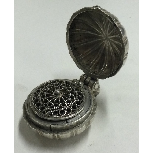 237 - An Antique silver pomander with hinged lid and grill. Approx. 17 grams. Est. £30 - £50.