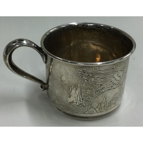 257 - An engraved American silver christening mug. Marked to base. Approx. 44 grams. Est. £80 - £120.