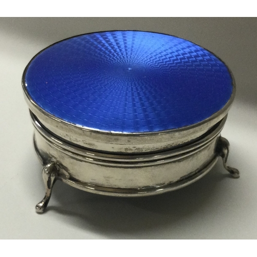 268 - A silver and blue enamelled jewellery box on feet. Birmingham 1929. Approx. 115 grams. Est. £150 - £... 