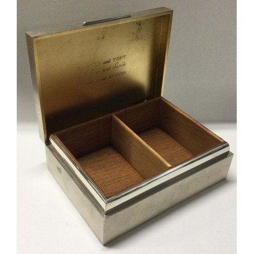 269 - ASPREY & CO: A heavy silver cigar box with engine turned decoration. London 1966. Approx. 625 grams ... 