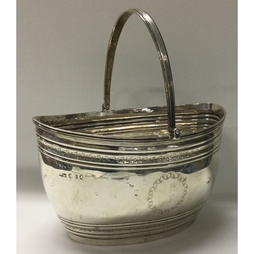 274 - A Georgian silver swing handled basket. London 1802. Approx. 213 grams. Est. £140 - £160.