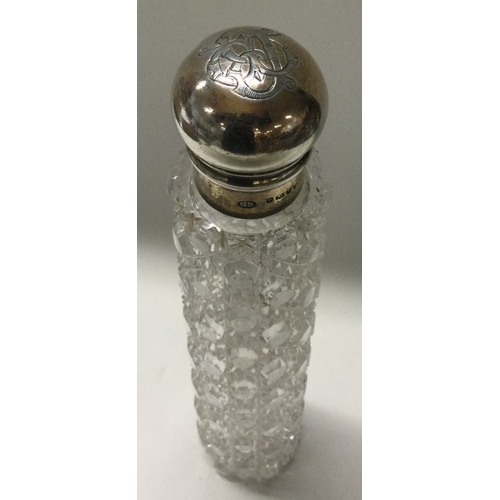 275 - A Victorian silver and glass scent bottle. London 1861. By George Grace. Est. £200 - £300.