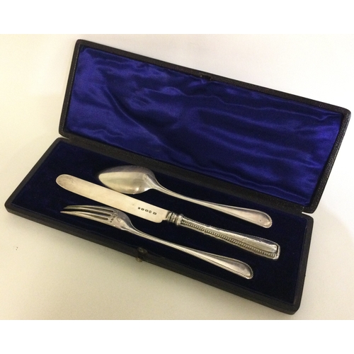 280 - A cased Victorian silver three piece christening set. Approx. 115 grams. Est. £80 - £120.